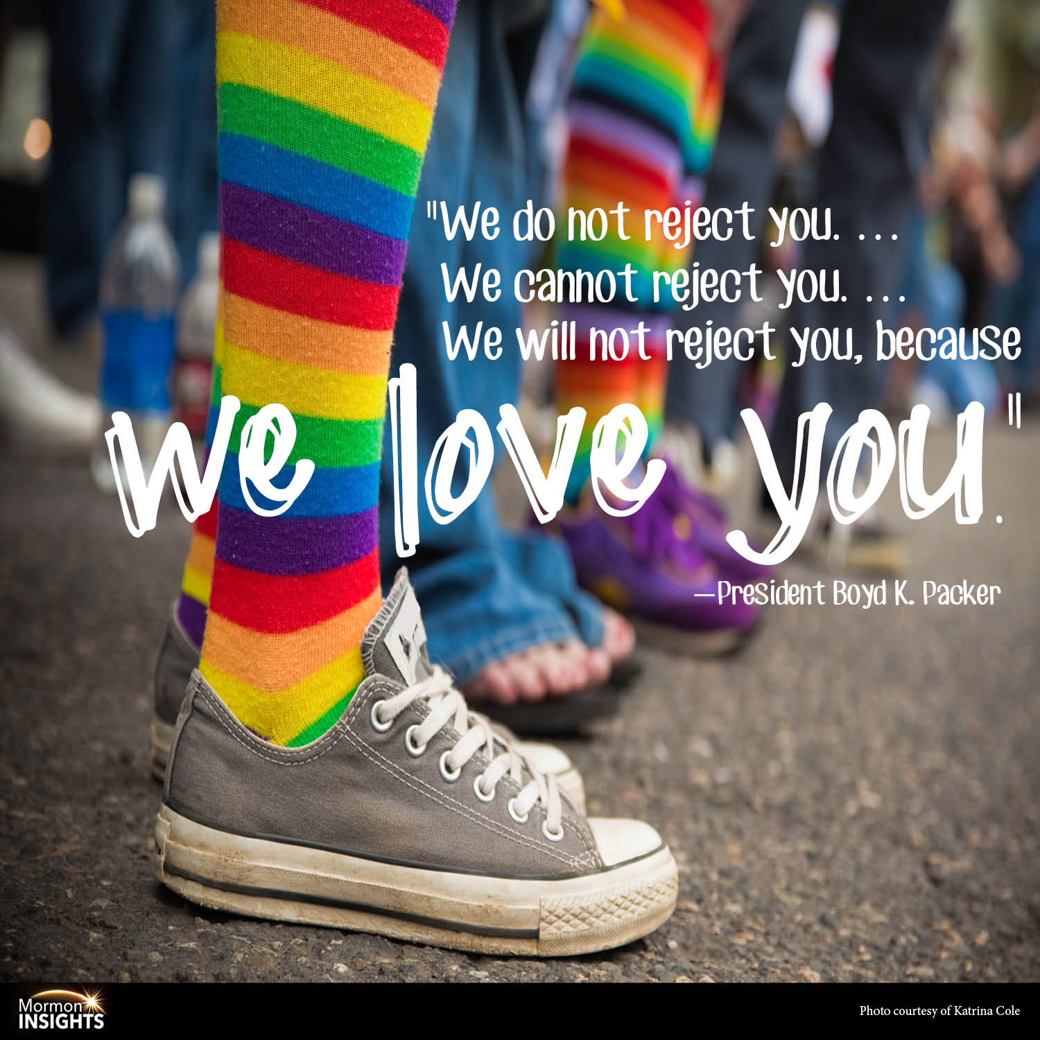 Rainbow socks with a quote: "We do not reject you.... we cannot reject you.... we will not reject you, because we love you."