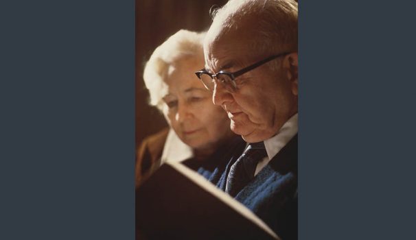 elderly couple reading.