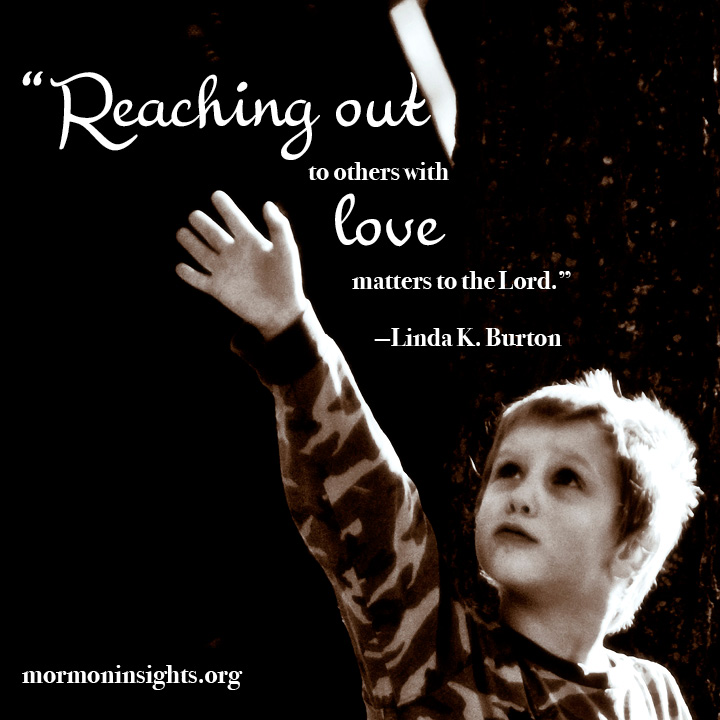 young boy reaching upwards toward a light with text that reads "Reaching out to others with love matters to the Lord." Linda K. Burton