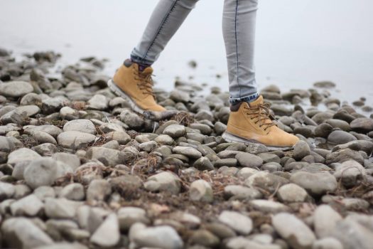 boots walking on rocks