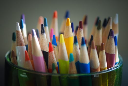 cup of colored pencils