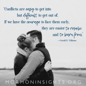 "Conflicts are easy to get into but difficult to get out of. If we have the courage to face them early, they are easier to resolve and to learn from." -Gerald R. Williams. A young man and young woman hold each other tightly on an empty airport landing strip