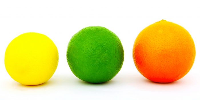 Three different citrus fruits