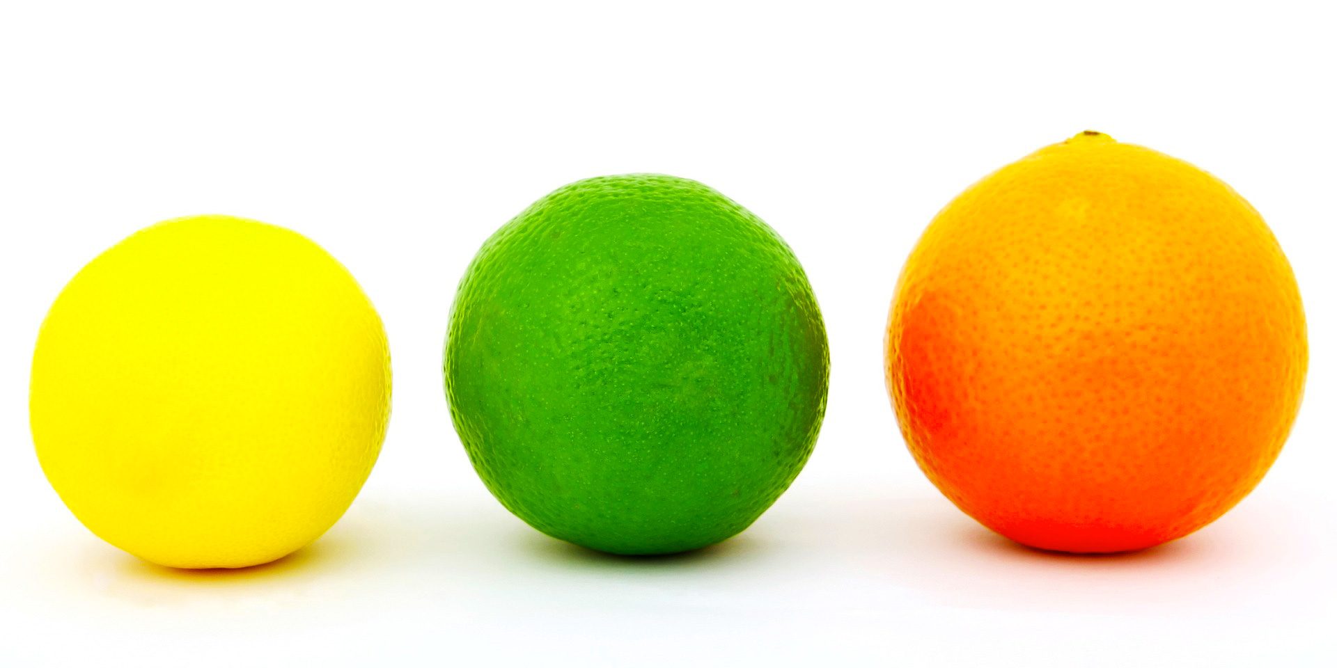 Three different citrus fruits
