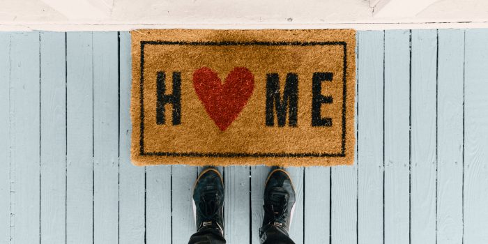 A doormat that says HOME.