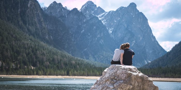 Couple in front of a lake