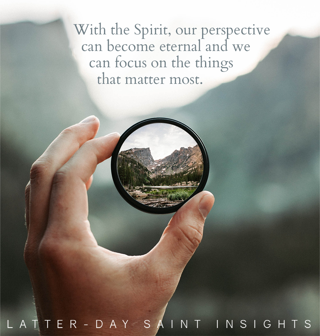 Someone holding a lens up to a blurry background. The scene is only clear through the lens. Quote: "With the Spirit, our perspective can become eternal and we can focus on the things that matter most."