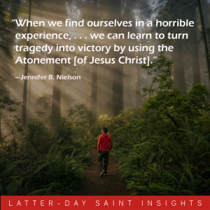 Quote by Jennifer B. Nielson: "When we find ourselves in a horrible experience,... we can learn to turn tragedy into victory by using the Atonement [of Jesus Christ]." A man in a red shirt walking down a dirt path in a forest. Sun rays shine through the tall trees.